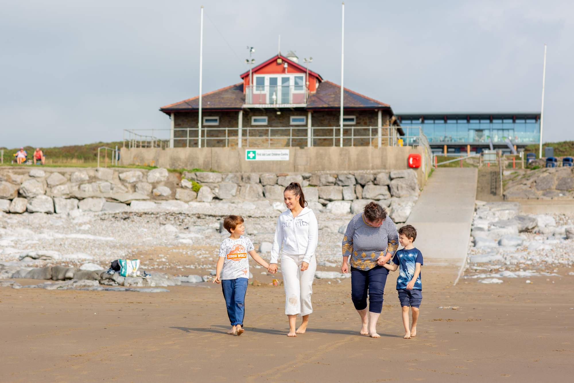 Family walking on the beach